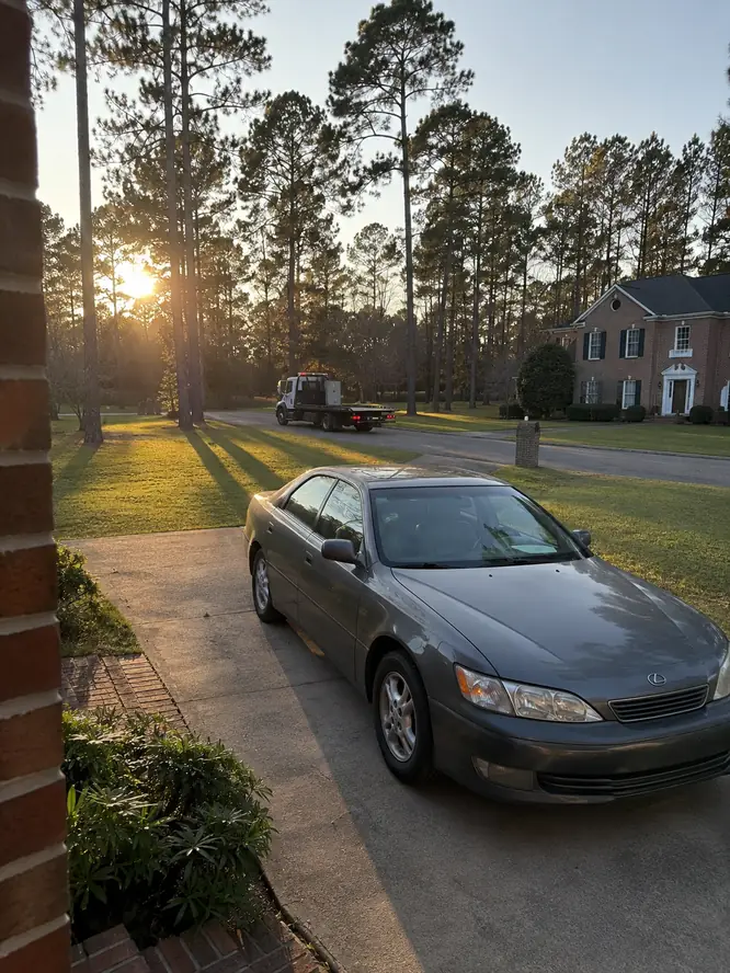Car delivered home by a tow truck in an Atascocita neighborhood
